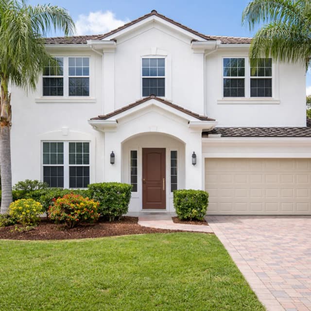 Clean home exterior after soft wash treatment
